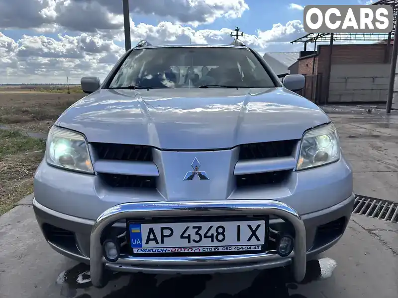 Внедорожник / Кроссовер Mitsubishi Outlander 2007 2 л. Ручная / Механика обл. Херсонская, Великая Александровка - Фото 1/12