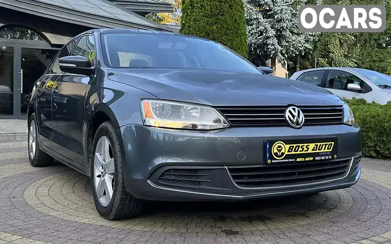 Седан Volkswagen Jetta 2013 2 л. Автомат обл. Львівська, Львів - Фото 1/21