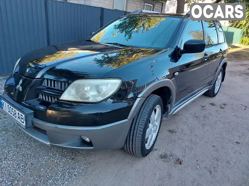 Позашляховик / Кросовер Mitsubishi Outlander 2005 2.38 л. Автомат обл. Полтавська, Кременчук - Фото 1/21